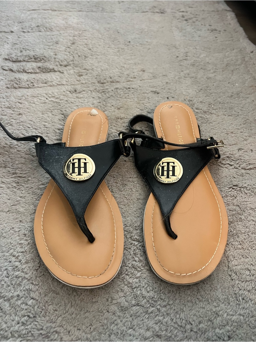 Tommy Hilfiger Black Leather T‑Strap Sandals with Gold Logo